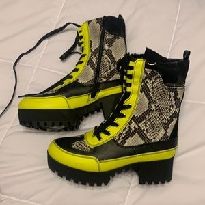Brand new never worn snake and like green boots.